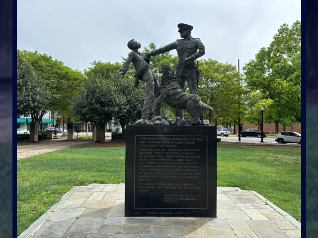 Sculpture in Birmingham’s Kelly Ingram Park depicting a young Black man being attacked by a police dog held by an officer.