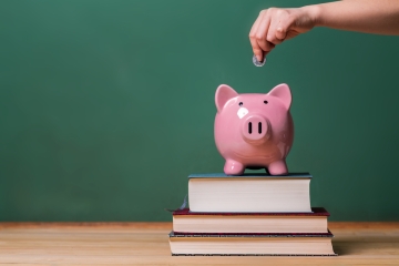 Piggy bank and chalkboard