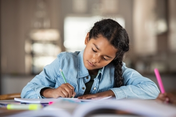 Female student doing homework