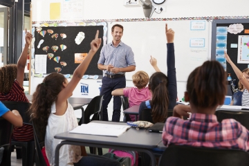 Teacher in front of a class of students