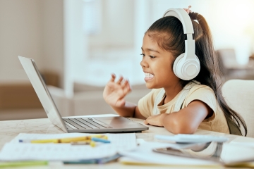 Student using a computer at home