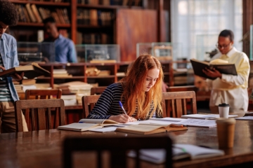 Student working in a library