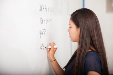 Girl solving equation