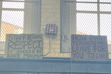 Protest signs at a Harlem high school