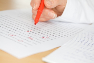 Paper with red ink