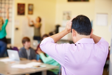 Teacher in an unruly classroom