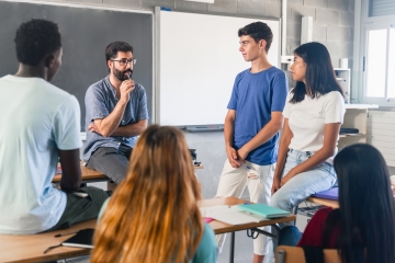High schoolers in a classroom discussion 