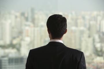 Business man in a skyscraper 