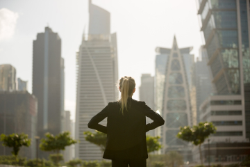 Young professional outside buildings