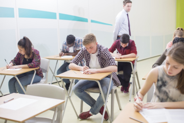 Teenagers taking a test