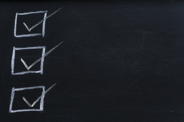 3 checkmarks on a chalkboard