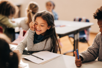 Happy student in a classroom