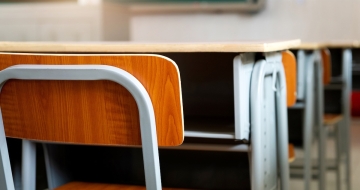 Empty desk in a classroom