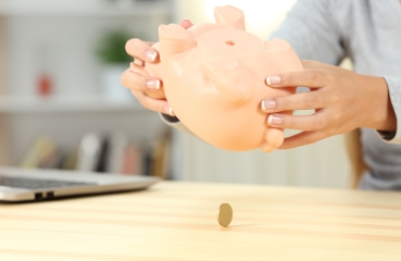 Upside down empty piggy bank