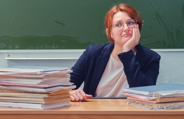 Teacher bored in classroom