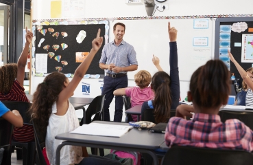 Teacher in front of a class of students