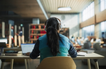 College student studying in library