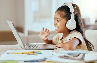 Student using a computer at home