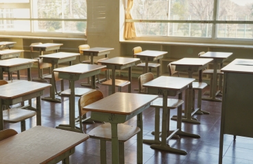 Empty desks in a classroom