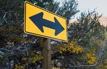 Road sign with two arrows