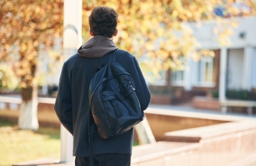 Student standing outside school