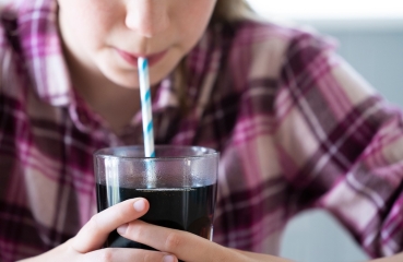 Child drinking soda