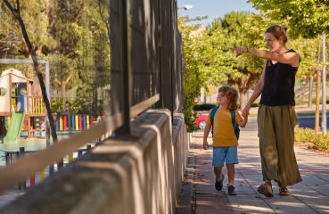 Parent walking with child to school