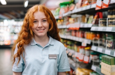 Teenager working in a grocery store