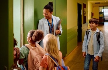 Teacher in a school hallway