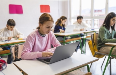 Student using a computer in class