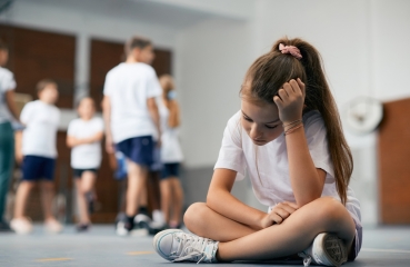 Sad student in gym class