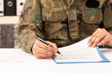 Military personnel writing