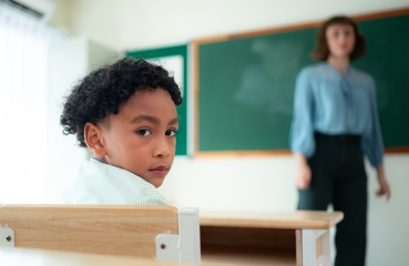 Sad student in a classroom