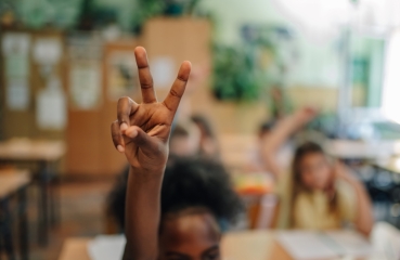 Student raising her hand