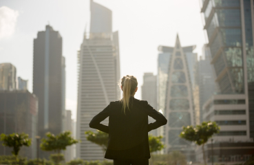 Young professional outside buildings