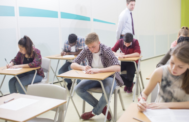 Teenagers taking a test