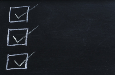 3 checkmarks on a chalkboard