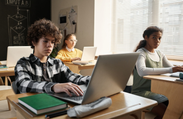 Sad students on computers