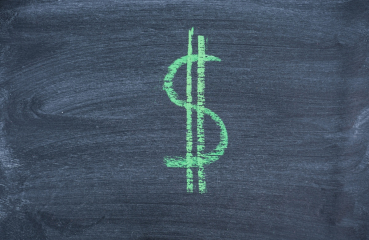 Dollar sign on chalkboard