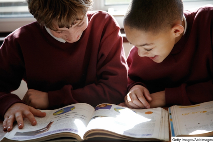 Students reading in a classroom