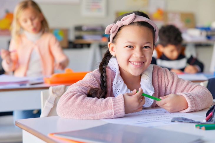 Happy child in school