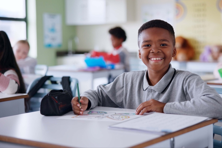 Happy child in school