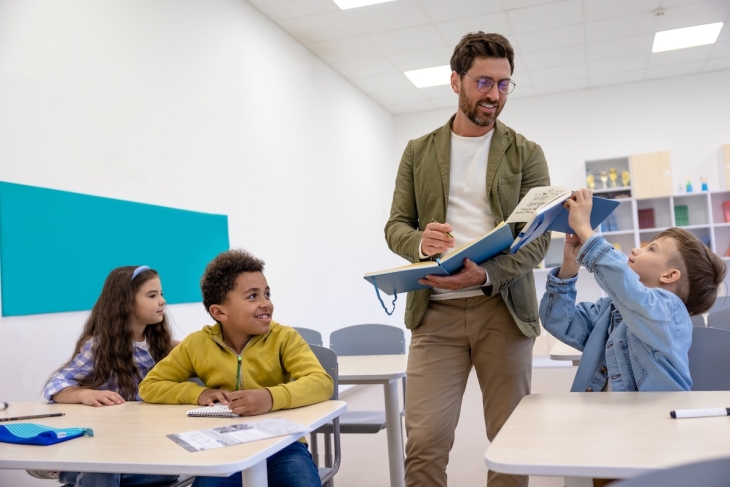 Teacher speaking to students