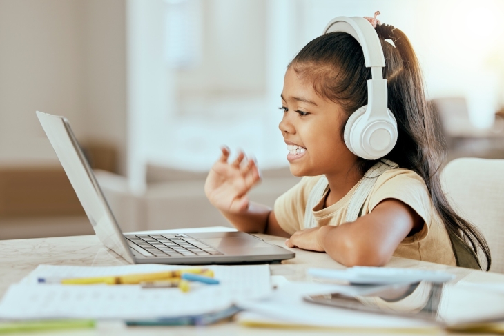 Student using a computer at home