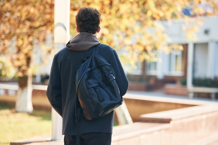 Student standing outside school