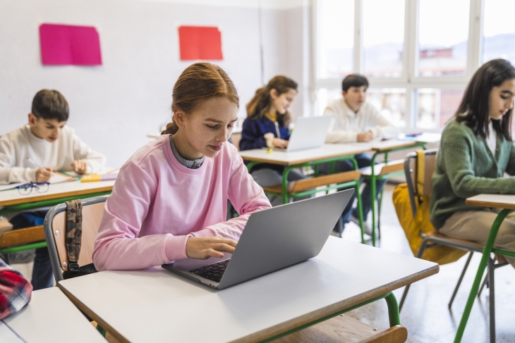 Student using a computer in class