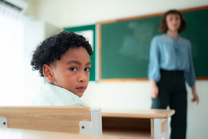 Sad student in a classroom