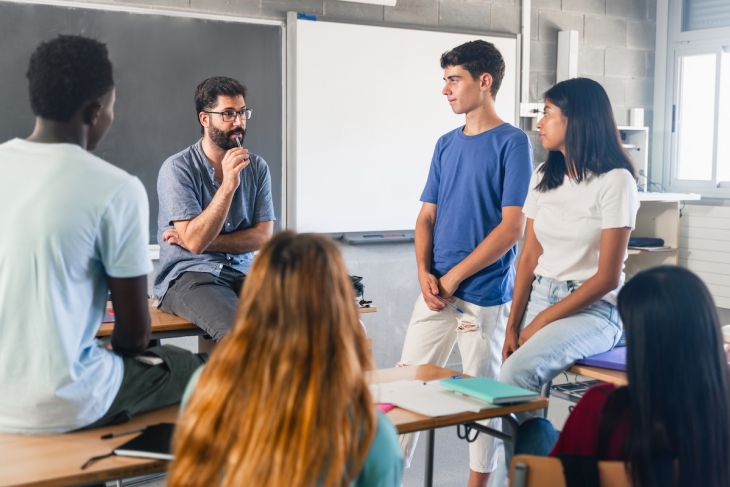 High schoolers in a classroom discussion 